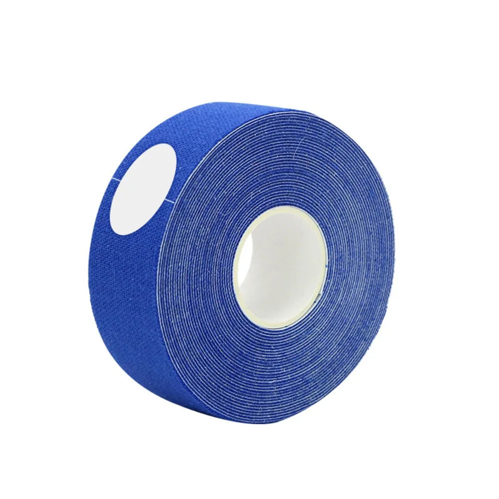 A roll of blue textured, fabric-like face toning tape on a white plastic core, set against a plain white background.