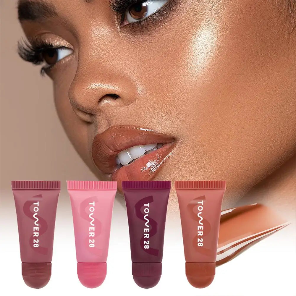 Tower 28 4pc lip jelly set: hydrating, mirror-shine tinted balm tubes in various shades for a glossy finish.