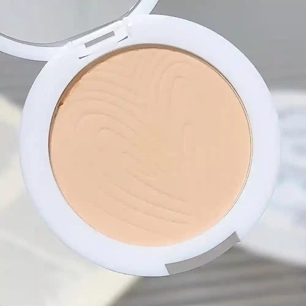 Tidesmit natural matte pressed powder for oil control and brightening face base in a detailed compact texture view