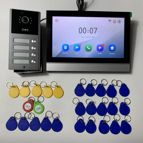 10-inch video intercom set showing door panel, monitor screen, and assorted key fobs