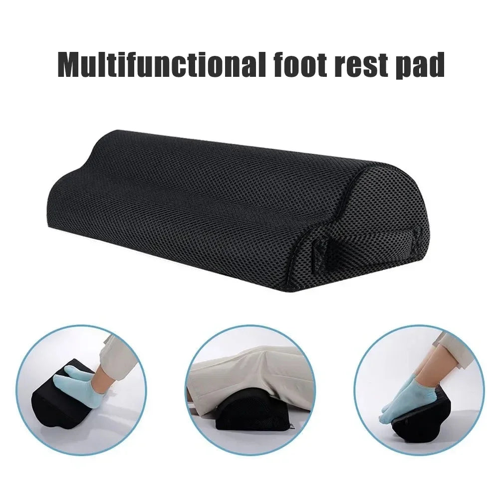 Black ergonomic memory foam foot rest for under desk with non-slip base, washable cover, for leg and feet relief.