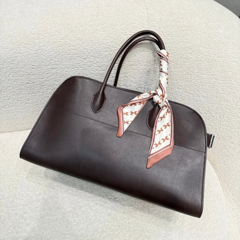 Unisex saddle leather all steel hardware inner sheepskin single shoulder large capacity hand-held horizontal bag