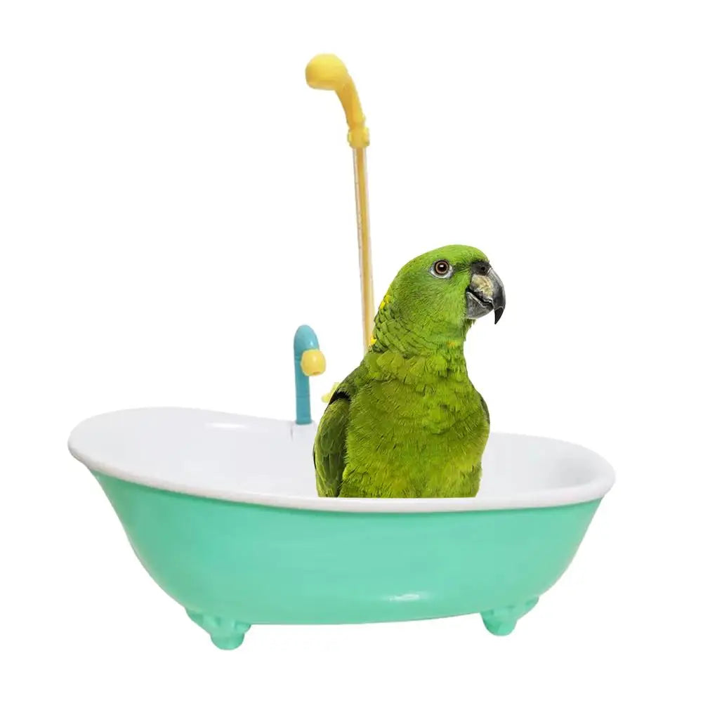 Green parrot bathing in an automatic plastic bird shower tub with yellow faucet, perfect for cage hygiene.