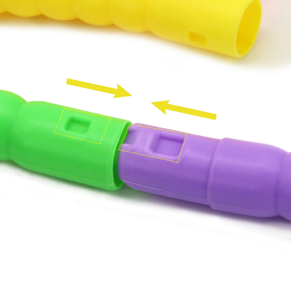 Colorful, portable dog agility training jumping poles, easy to assemble plastic equipment for outdoor pet exercise.