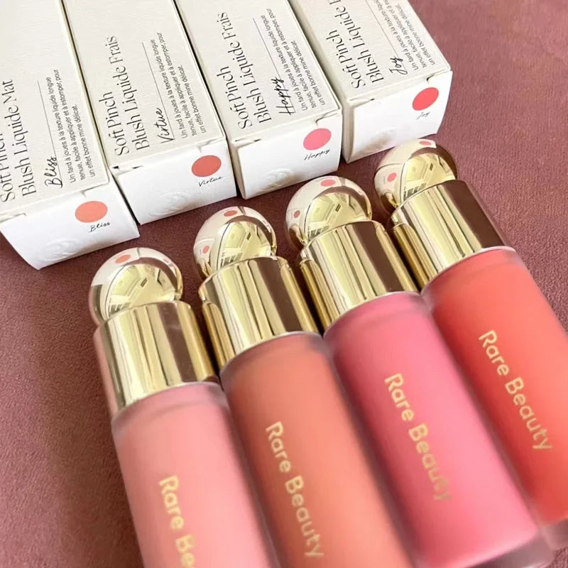Tidesmit Positive Light Liquid Luminizer and Soft Pinch Blusher texture close-up for radiant face makeup glow