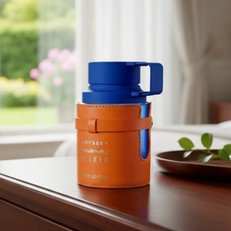 Armaf Odyssey Elixir: 100ml men's Arabian EDC cologne in a unique blue bottle with an orange leather-style sleeve.