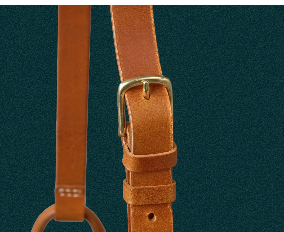 Tan genuine cowhide leather adjustable shoulder bag strap with antique brass buckle hardware for designer messenger bag.