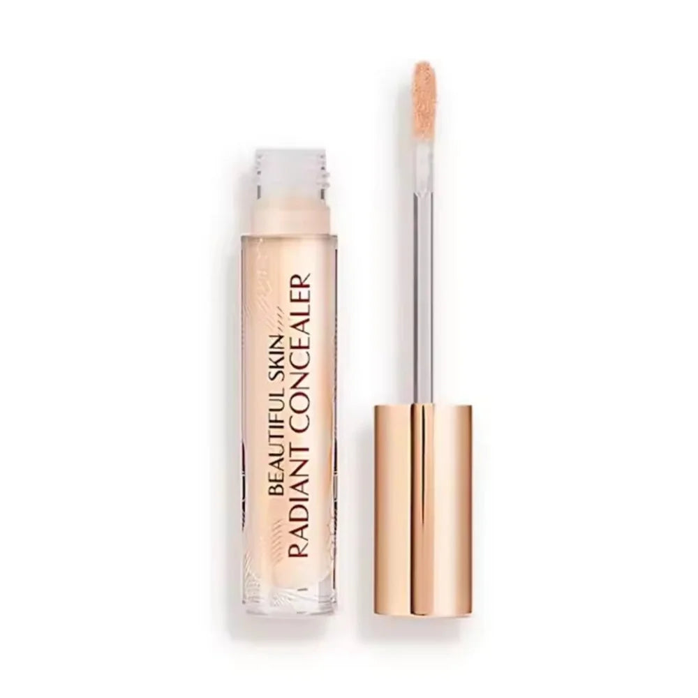 Charlotte Tilbury Beautiful Skin Radiant Concealer with doe-foot applicator in a clear tube with metallic rose gold cap.
