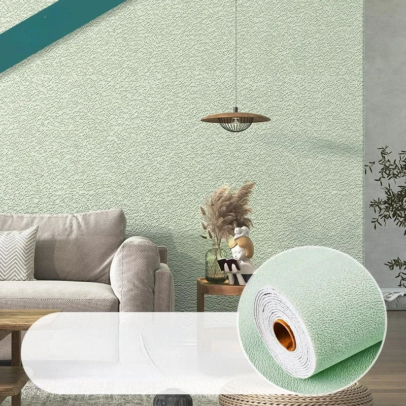Self-adhesive textured wall panel wallpaper roll, pale mint; roll close-up on textured wall
