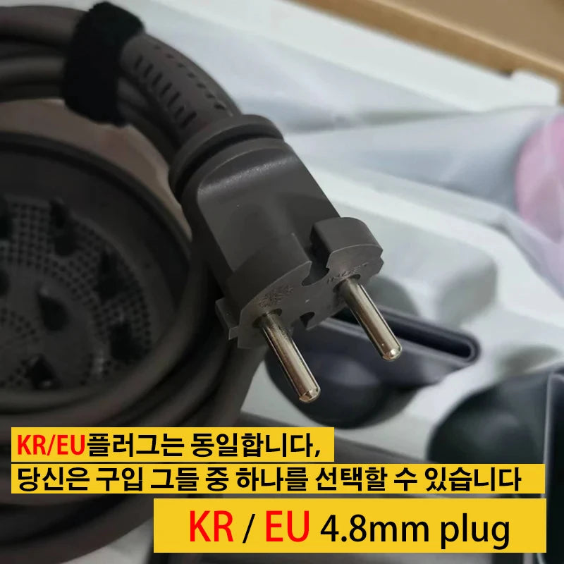 Grey 1600W leafless hair dryer showing 4.8mm KR/EU power plug and professional styling attachments in kit.