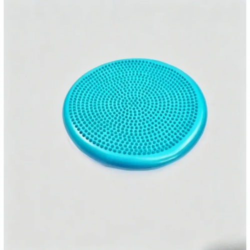 Anti-burst inflatable balance pad, smart yoga mat accessory for physical therapy, studio view, blue textured cushion.