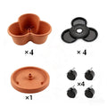 Terracotta 3-petal modular planter inserts, black base panels, and 4 caster wheels