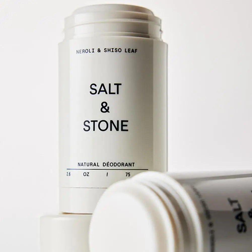 SALT&STONE natural plant-based unisex deodorant stick with Black Rose, Oud, Neroli, and Basil for odor elimination.