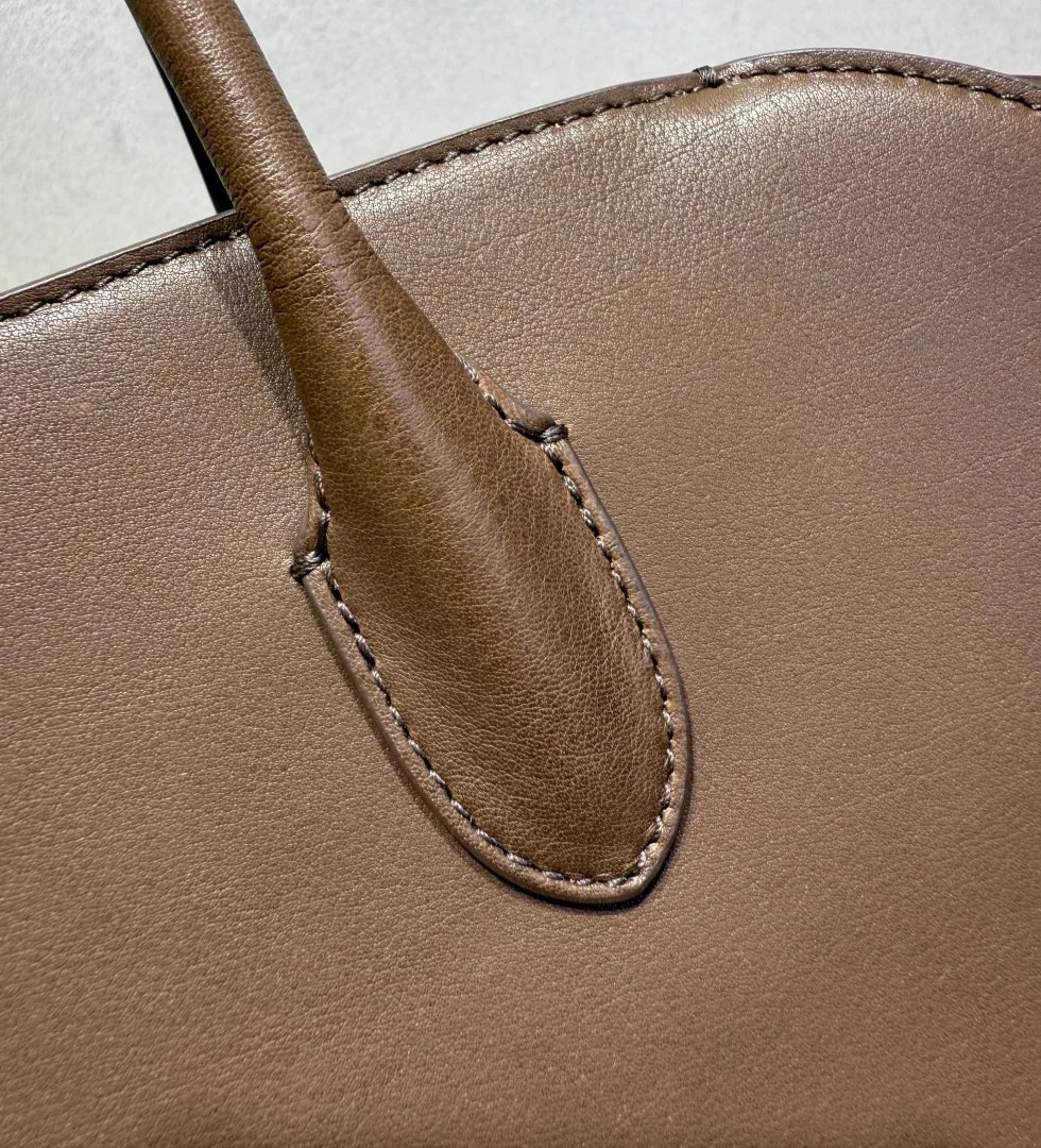 2026 high-quality genuine leather Marlo 12 inch 14 inch saddle leather tote bag, women's shoulder bag, high-end leather texture,