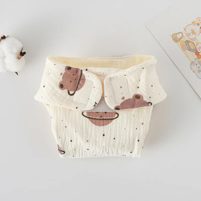 Reusable cotton muslin baby diaper cover with cute bear print, adjustable velcro design for infant baby care.
