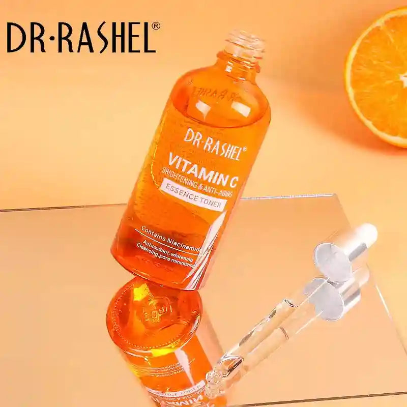 Dr. Rashel Vitamin C Essence Toner in orange glass bottle for skin brightening, anti-aging, and moisturizing care.