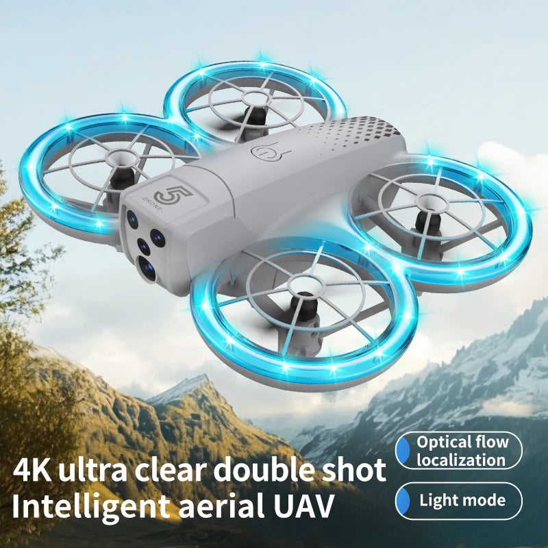 Compact white camera drone with four propeller guards featuring glowing blue LED rings for aerial photography.