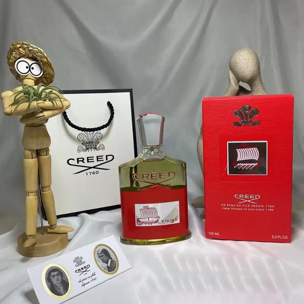 Creed Viking Eau de Parfum for men: red bottle, 100ml spray with gift box and iconic Creed branding. Luxury fragrance.