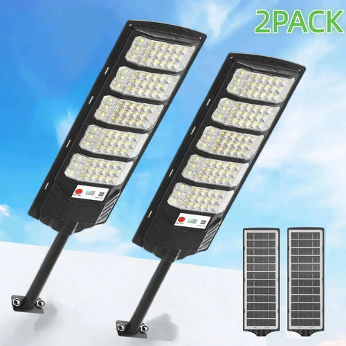 Black solar LED street light pair with rectangular head and mounting bracket