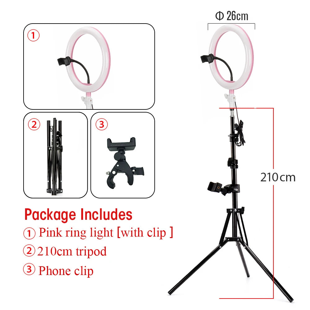 26cm pink LED ring light on a 210cm adjustable tripod stand with a phone clip for photography and video recording.