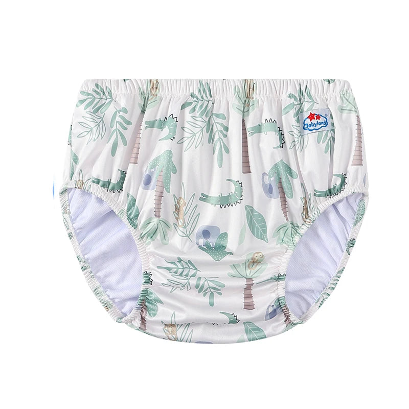 Babyland reusable baby swim diaper with green alligator and jungle print. Waterproof baby care diaper for water play.