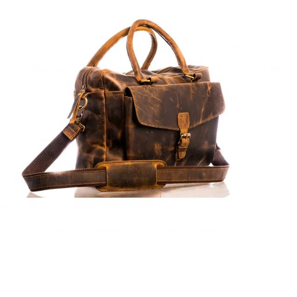 Distressed brown PU leather travel trunk duffel bag with buckled front pocket, handles, and adjustable shoulder strap.