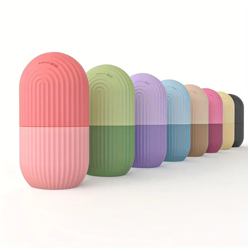 A line of colorful, ribbed silicone capsule-shaped ice rollers for face massage, standing on a white background.