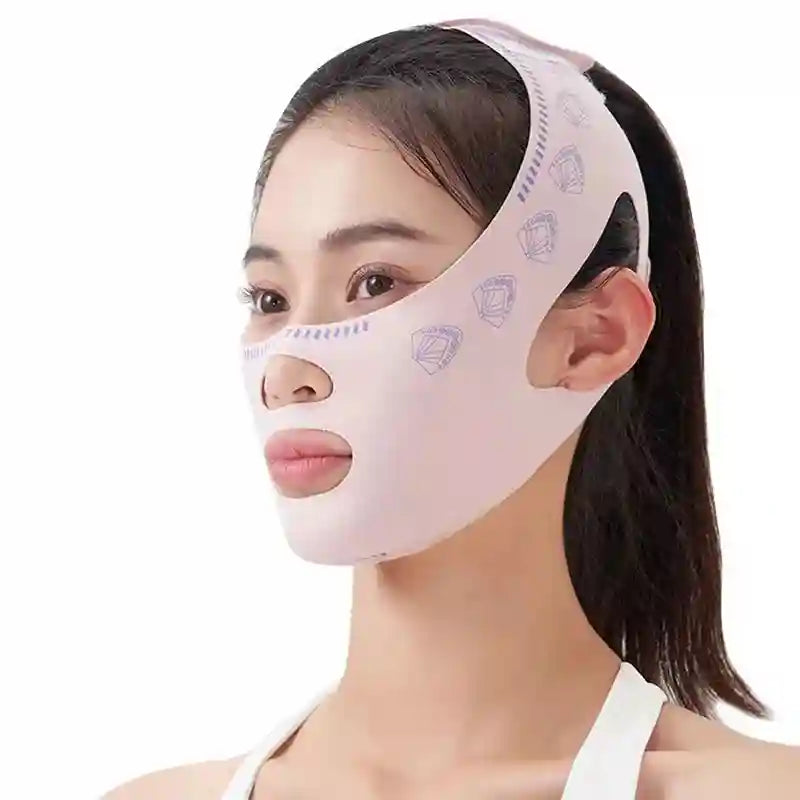 A woman wearing a pale pink, flexible face-sculpting bandage with small purple fan patterns and cutouts for the face.