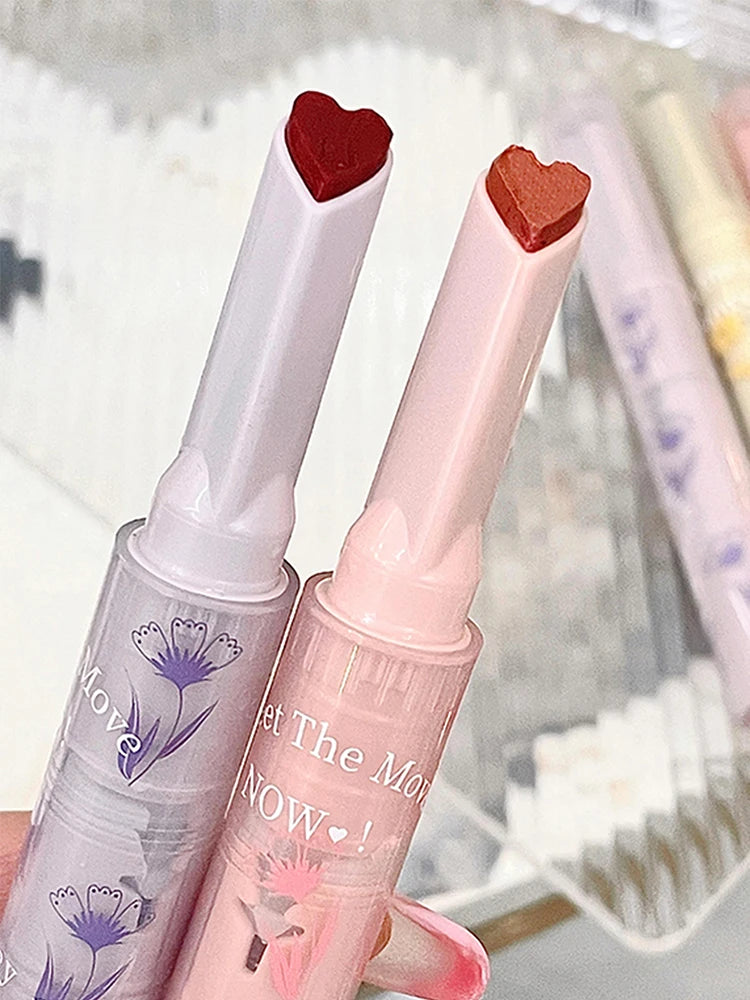 Gege Bear heart-shaped glossy lipsticks with moisturizing jelly finish in purple and pink floral packaging.
