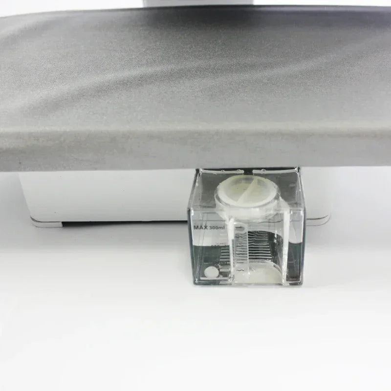 Tidesmit 1600W commercial steam ironing machine showing side detail of large area dry press for hotel laundry use