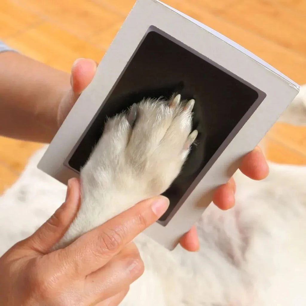 Clean-touch ink pad for dog or cat paw print keepsakes. Mess-free, inkless DIY impression kit for pet memories.