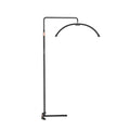 Black semi-circle LED floor lamp with an adjustable metal stand for beauty, makeup, or photography lighting.