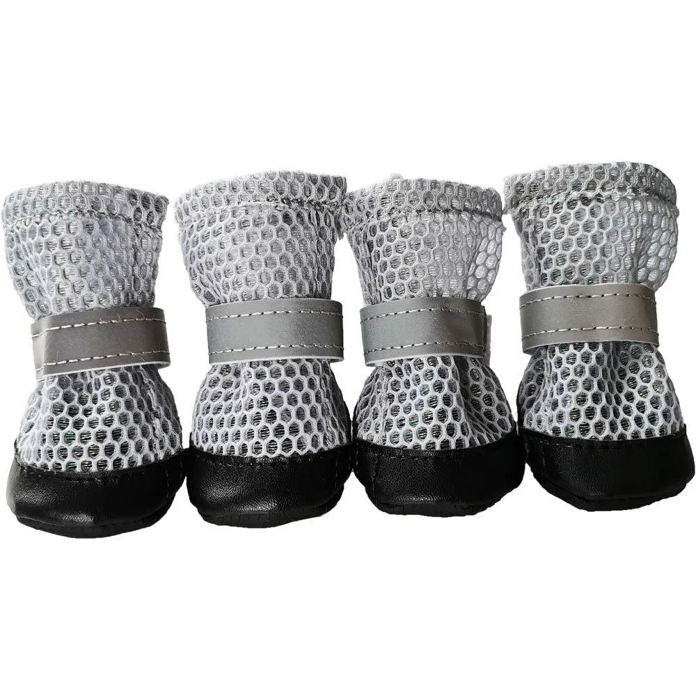 4pcs breathable, reflective dog shoes with anti-slip soles for paw protection during outdoor walks and hiking.