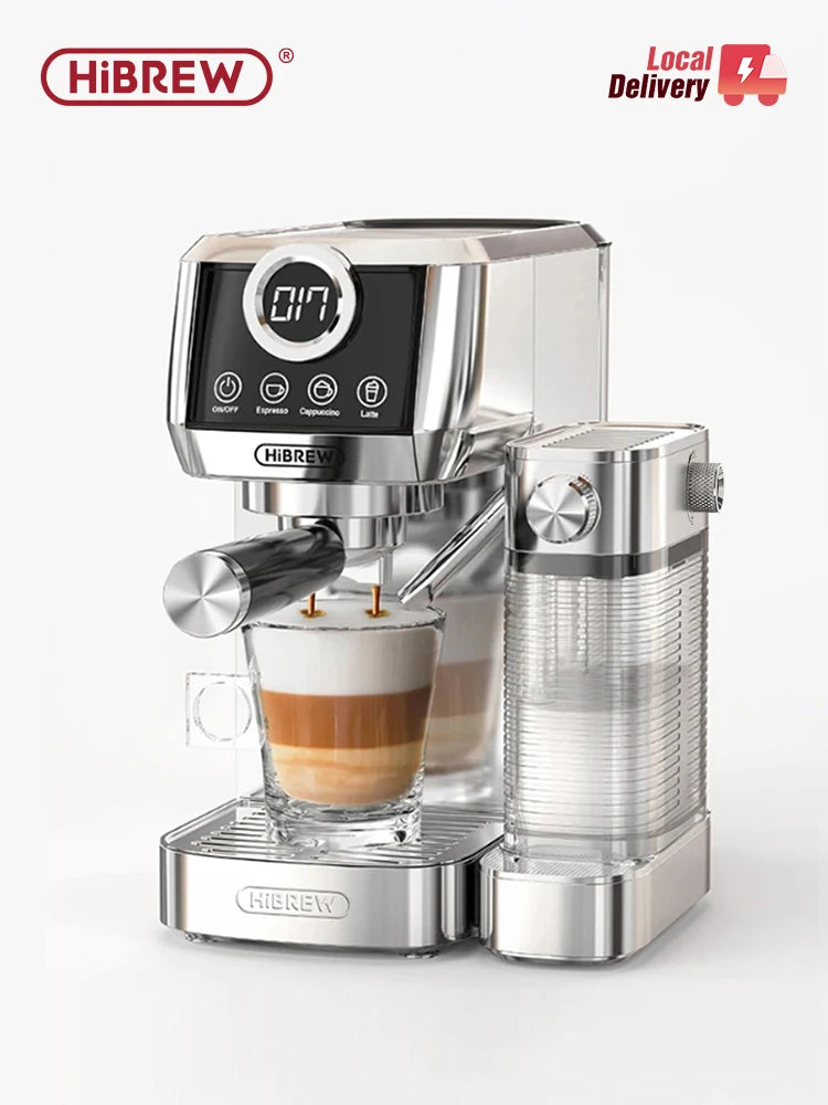 HiBREW silver stainless steel espresso machine with digital touch display and milk frother tank brewing a latte.