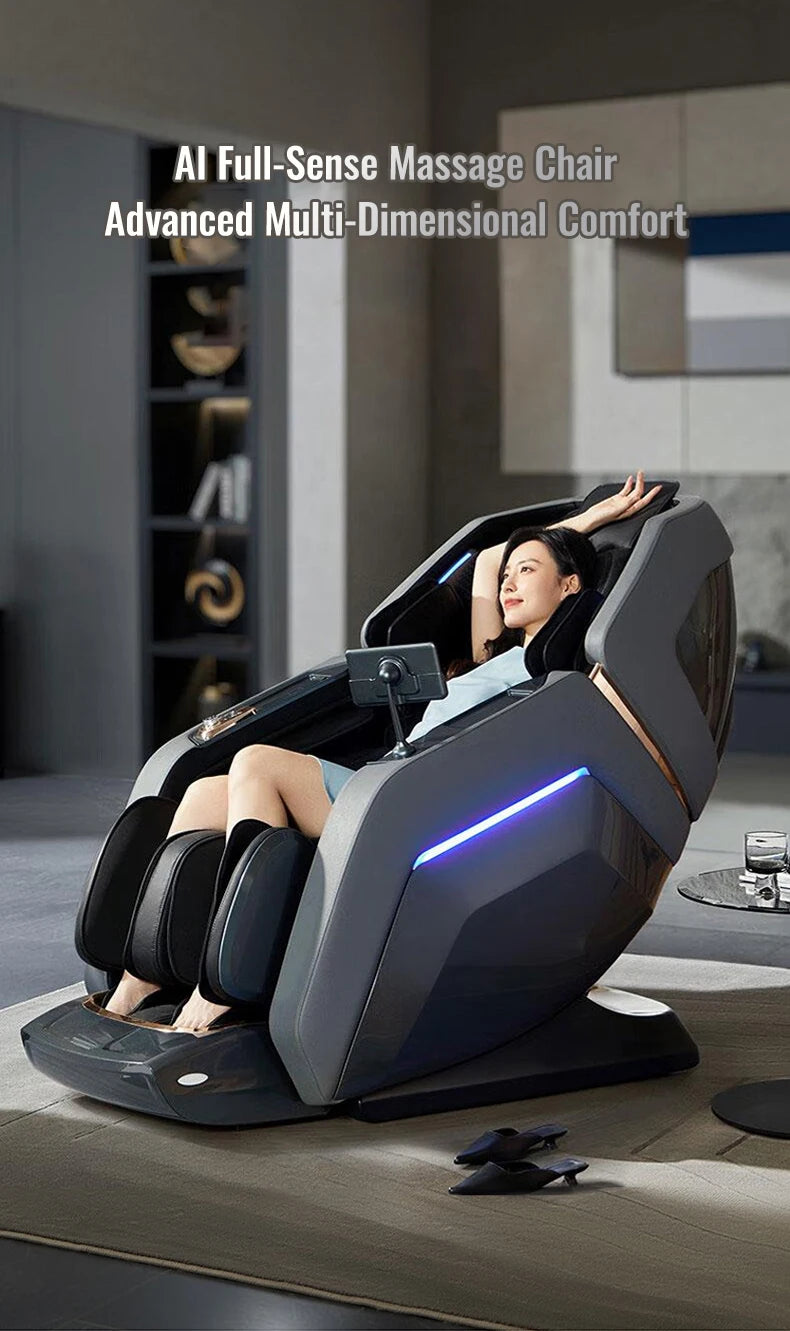 A woman sits in a sleek, charcoal-grey 4D massage chair with blue LED side lighting in a modern living space.