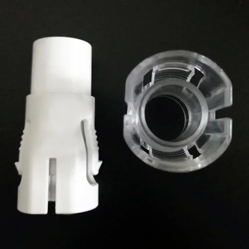 White CPAP hose swivel connector and clear locking ring for sleep apnea tubing replacement.