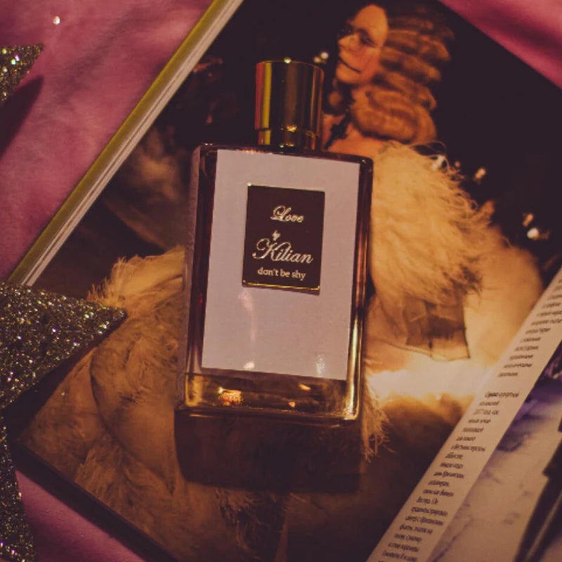 Kilian Love, Don't Be Shy EDP: Unisex oriental floral niche perfume in a square 50ml glass bottle with gold cap.