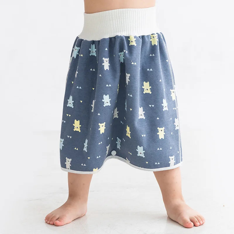 Waterproof baby diaper skirt with blue bear pattern and high elastic waist for potty training.