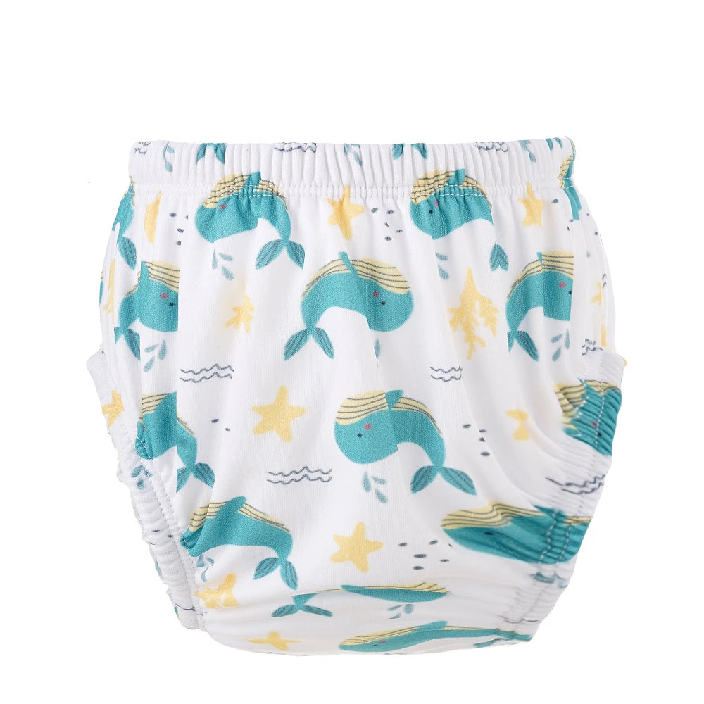 Reusable baby training diaper with blue whale and yellow starfish print for toddler potty training.