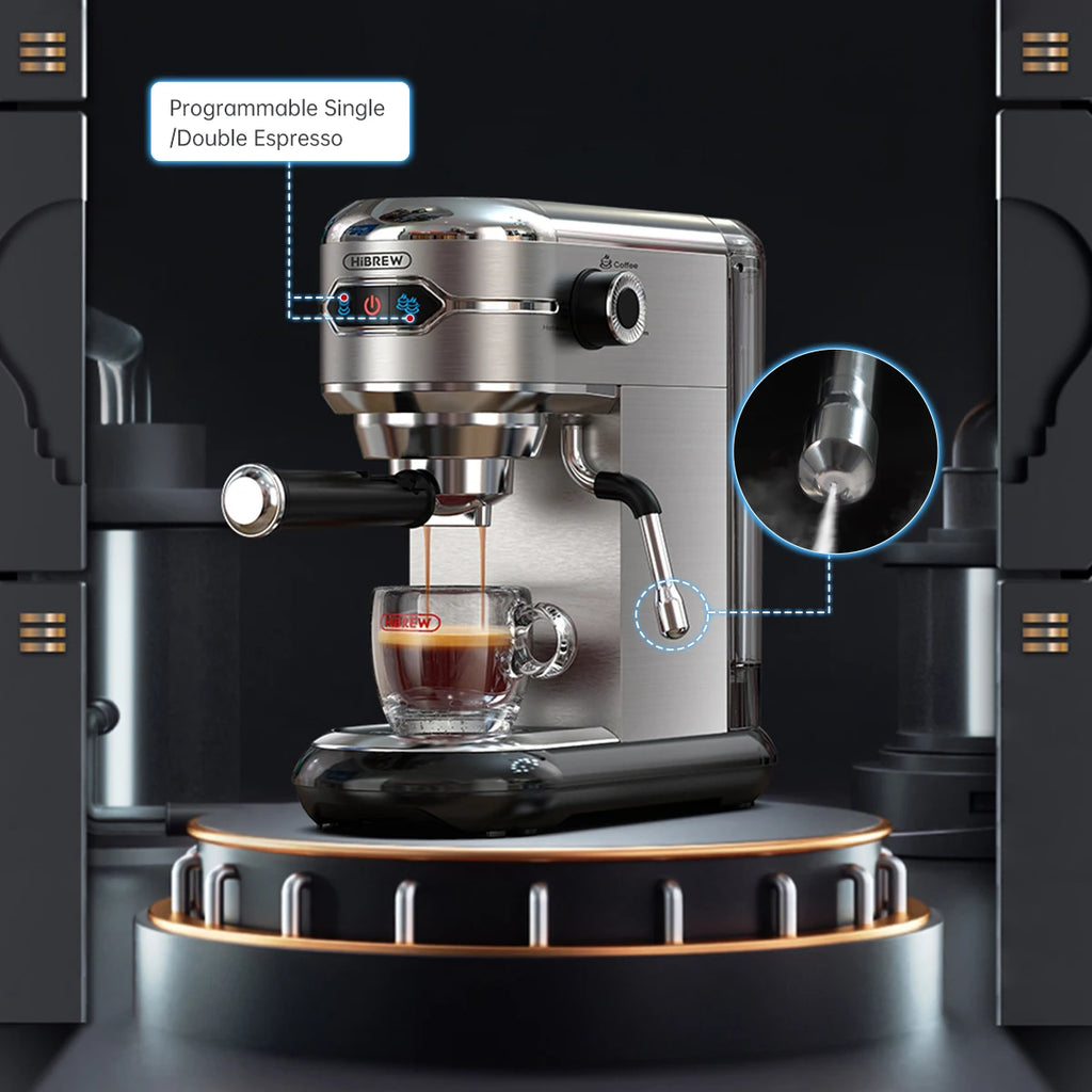 HiBREW stainless steel espresso machine with steam wand, programmable shot buttons, and clear glass cup on display.