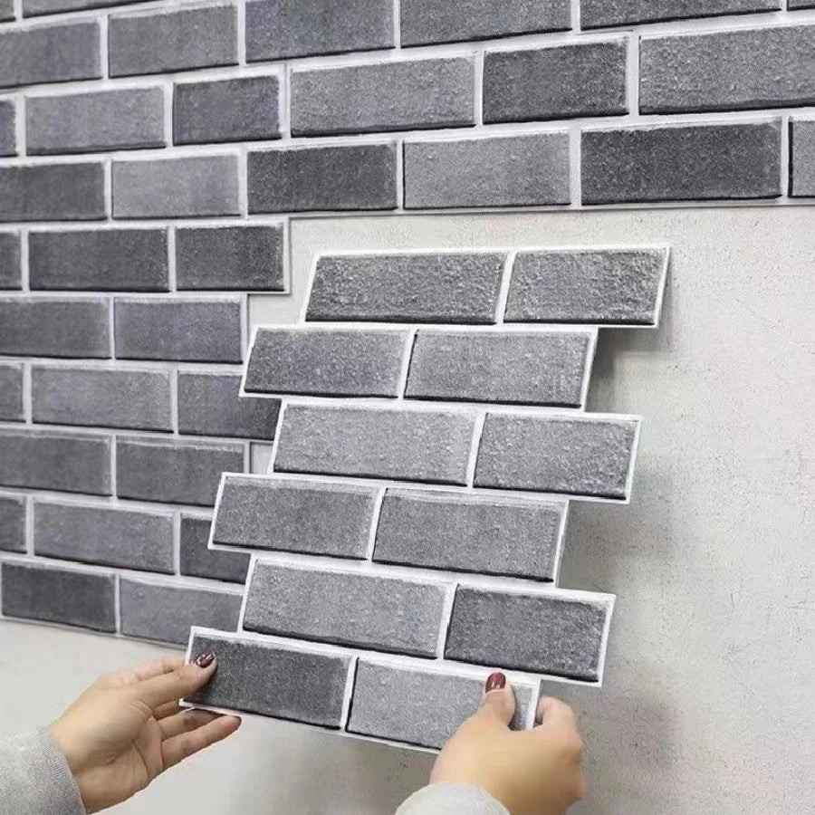 Peel-and-stick backsplash tiles with gray brick pattern and matte stone texture