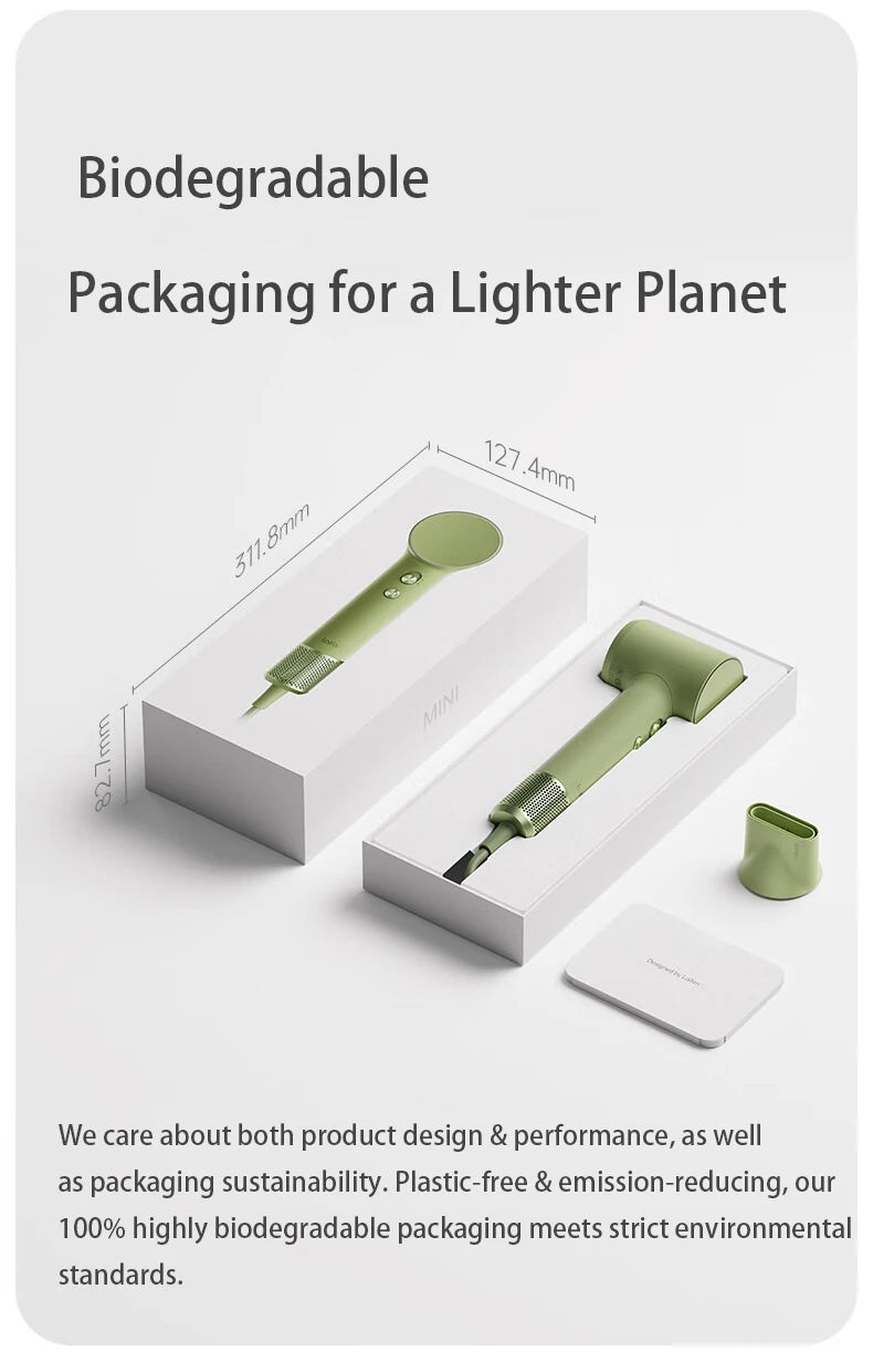 Laifen Mini high-speed hair dryer in sage green with nozzle attachment in eco-friendly biodegradable packaging.