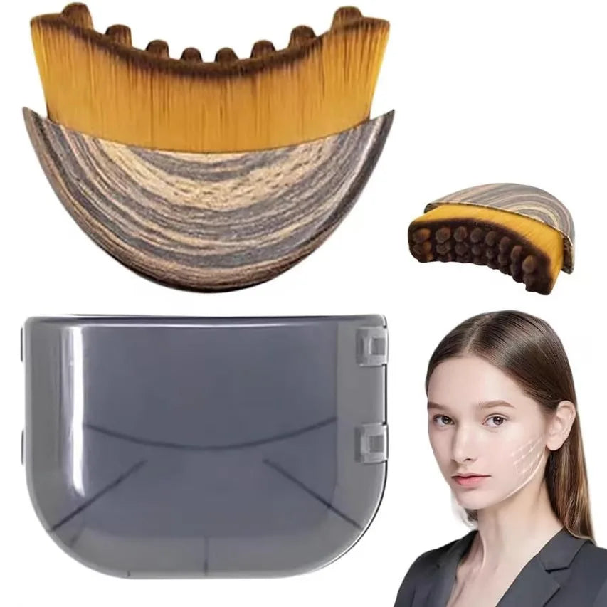 Crescent-shaped facial contouring brush with wood-grain handle, tan bristles, and a grey storage case.