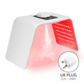 White arched LED light therapy machine with a red light panel, mist nozzle, digital control, and a 3-pin UK plug.