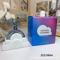 Ariana Grande Cloud EDP 100ml perfume for women. Iconic white cloud bottle and blue iridescent box. Long-lasting scent.