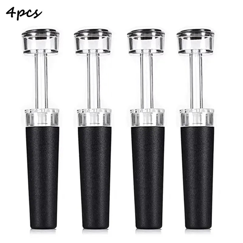 4-piece vacuum wine bottle stopper set with black textured silicone bodies and clear pump tops