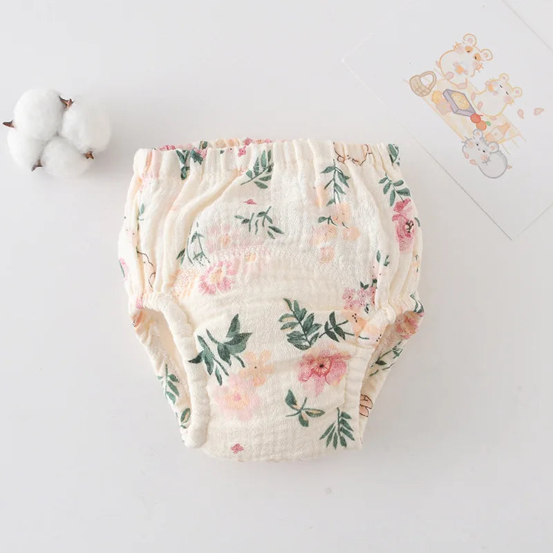 Baby care reusable cotton training diaper with floral print design.