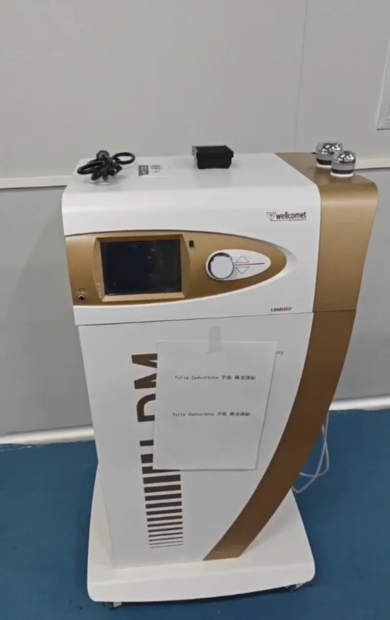 White and gold LDM anti-aging beauty machine with digital screen, touch controls, and two professional probes.