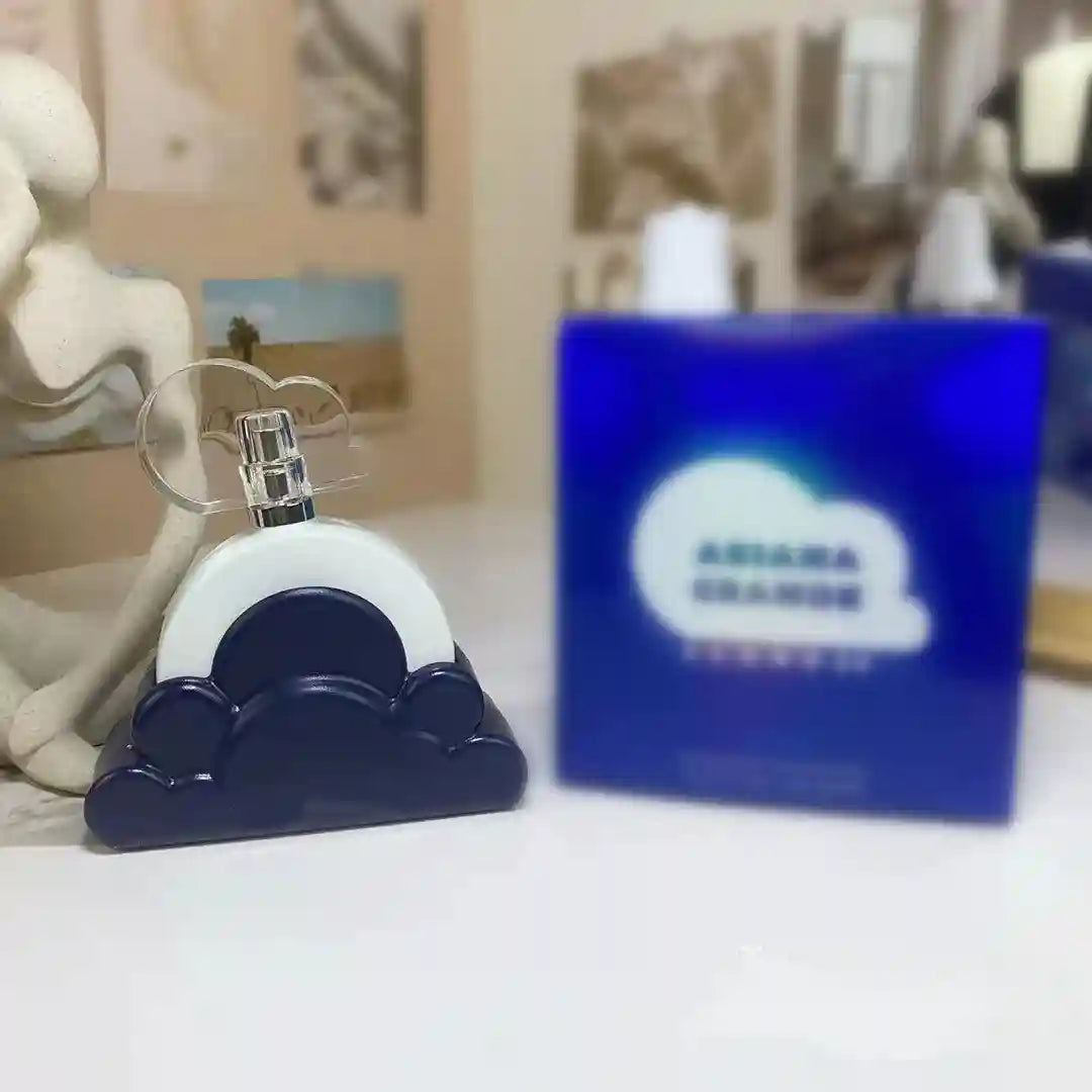 Ariana Grande Cloud Intense 100ml EDP ladies fragrance, unique navy blue cloud-shaped bottle with white perfume sprayer.