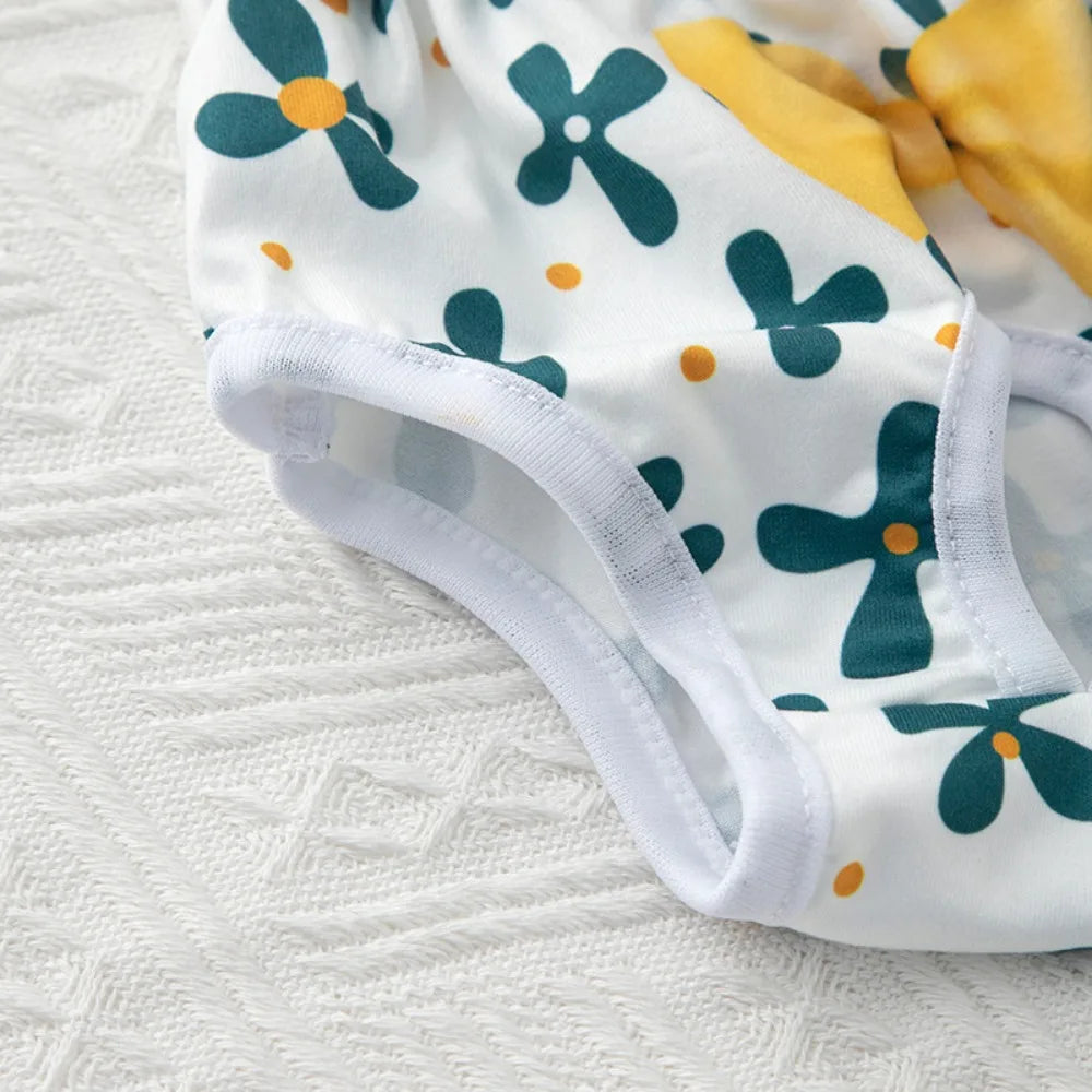Washable floral dog diapers, reusable sanitary pants for female pets, soft fabric for comfortable heat protection.